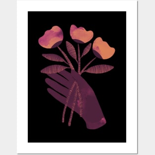 Brown hand with brown orange and pink flowers on black background Posters and Art